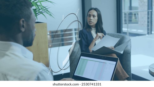 Image of data processing over business people working in office. Global computing, finance, business and data processing concept digitally generated image.