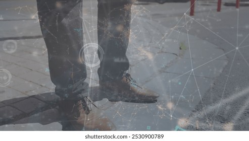 Image of data processing over businessman walking. Global business and digital interface concept digitally generated image. - Powered by Shutterstock