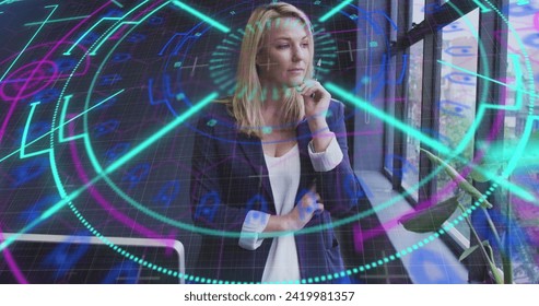 Image of data processing over caucasian businesswoman in office. Global business, finances, computing and data processing concept digitally generated image.