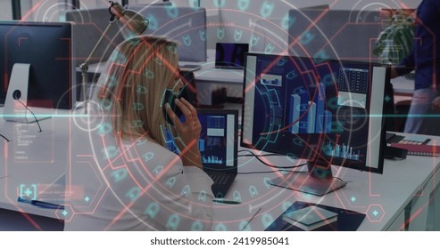 Image of data processing over caucasian businesswoman working in office. Global business, finances, computing and data processing concept digitally generated image.