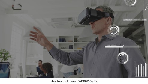 Image of data processing over caucasian businessman using vr headset. Global artificial intelligence, connections, computing and data processing concept digitally generated image.