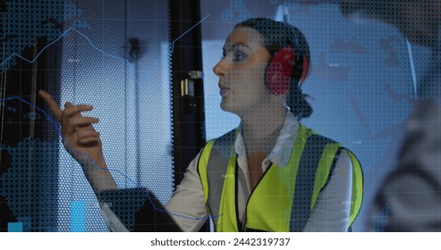 Image of data processing over caucasian female it engineer with tablet checking computer servers. data processing, cloud computing concept and technology concept digitally generated image.