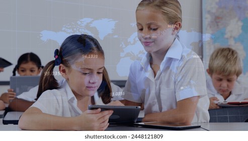 Image of data processing over caucasian school children with tablets. Global education, learning and data processing concept digitally generated image.