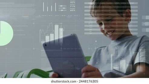 Image of data processing over caucasian boy using tablet. Global business, computing and digital interface concept digitally generated image. - Powered by Shutterstock - Get 15% off with code: PIKWIZARD15