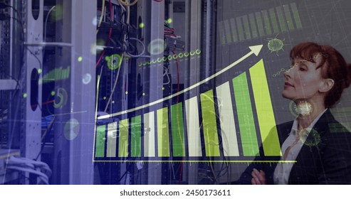 Image of data processing over caucasian female worker in server room. Global technology and digital interface concept digitally generated image.