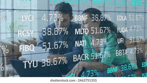 Image of data processing over caucasian couple using laptop. Global business and digital interface concept digitally generated image.