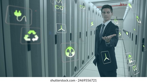 Image of data processing over caucasian man in server room. Business partnership and technology concept.