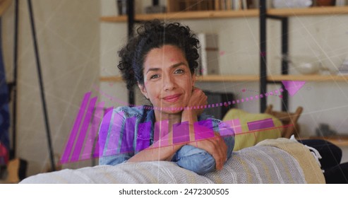 Image of data processing over caucasian woman at home. Global computing, digital interface and data processing concept digitally generated image.