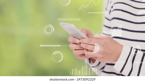 Image of data processing over caucasian woman using smartphone. Global business and digital interface concept digitally generated image.