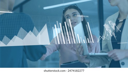 Image of data processing over caucasian woman shaking hands with male colleague at office. Computer interface and business data technology concept