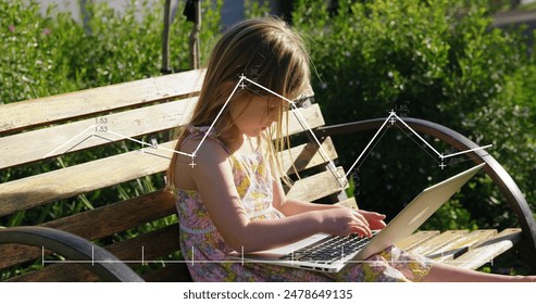 Image of data processing over caucasian girl using laptop. Global computing, digital interface and data processing concept digitally generated image.