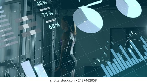 Image of data processing over caucasian woman lifting weights at gym. Global sport, computing and digital interface concept digitally generated image.