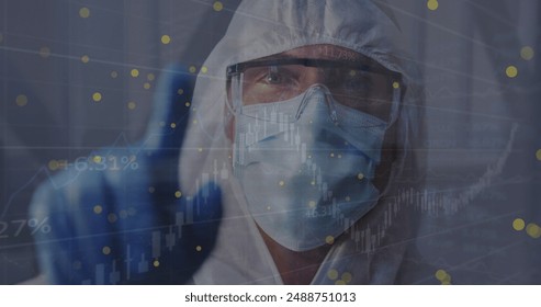 Image of data processing over caucasian male doctor with face mask. Global medicine and digital interface concept digitally generated image.