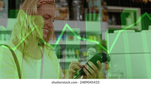Image of data processing over caucasian woman paying with credit card. Global business and digital interface concept digitally generated image. - Powered by Shutterstock - Get 15% off with code: PIKWIZARD15