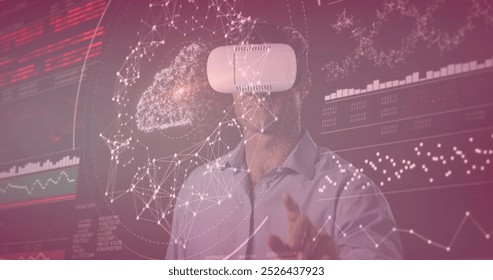 Image of data processing over caucasian man with vr headset. global technology and digital interface concept digitally generated image.