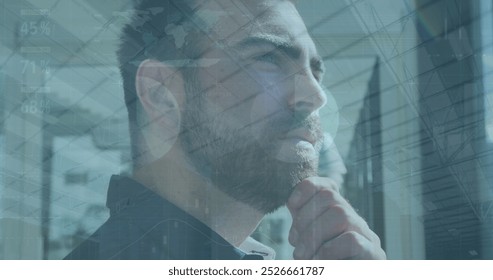 Image of data processing over caucasian businessman in office. Global business and digital interface concept digitally generated image.