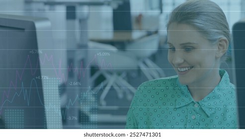 Image of data processing over caucasian businesswoman using computer. global business and digital interface concept digitally generated image.