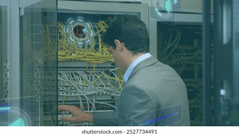 Image of data processing over caucasian man in server room. Global business finances connections and digital interface concept digitally generated image.