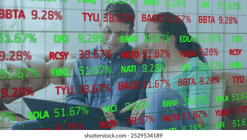 Image of data processing over caucasian couple using laptop. Global business and digital interface concept digitally generated image.