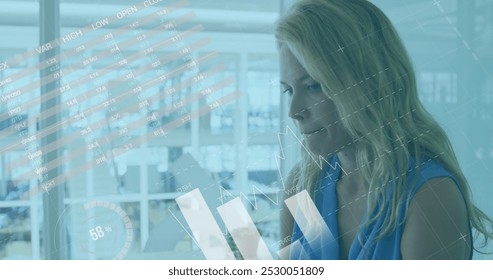 Image of data processing over caucasian businesswoman. Global cyber security, computing, digital interface and data processing concept digitally generated image.