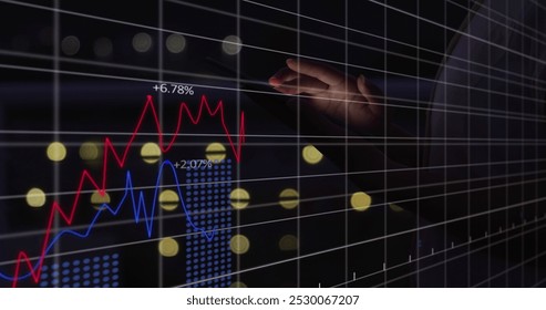 Image of data processing over caucasian businessman using tablet. Global business and digital interface concept digitally generated image.