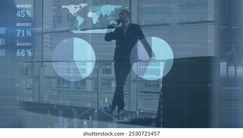 Image of data processing over caucasian businessman using smartphone. global business and digital interface concept digitally generated image.