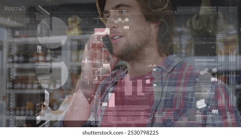 Image of data processing over caucasian businessman talking on smartphone. Global business and digital interface concept digitally generated image.