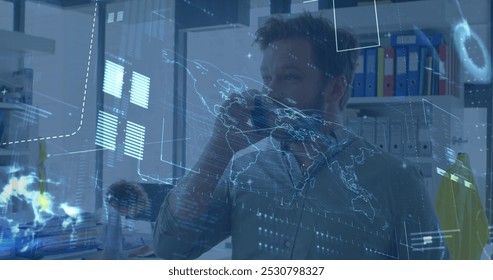 Image of data processing over caucasian businessman talking on smartphone. Global business and digital interface concept digitally generated image.