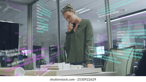 Image of data processing over caucasian businesswoman working at office. Global business and digital interface concept digitally generated image.