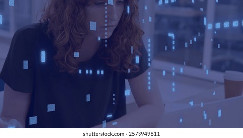 Image of data processing over caucasian businesswoman using computer in office. Global finance, business, connections, computing and data processing concept digitally generated image.