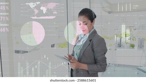 Image of data processing over caucasian businesswoman using tablet. Global communication, computing and digital interface concept digitally generated image.