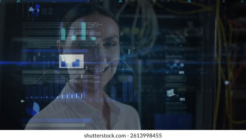 Image of data processing over caucasian female it engineer with laptop by computer server. data processing, cloud computing concept and technology concept digitally generated image.