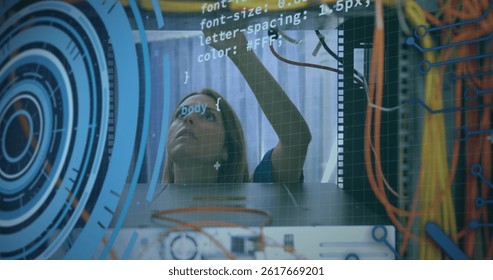 Image of data processing over caucasian woman inspecting server room. global technology and digital interface concept digitally generated image.