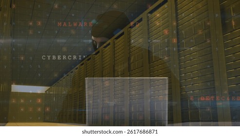 Image of data processing over caucasian male hacker and computer servers. global internet security, data processing and digital interface concept digitally generated image.