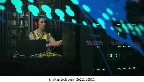 Image of data processing over caucasian female worker in server room. global business and digital interface concept digitally generated image.