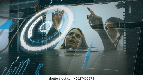 Image of data processing over caucasian man and woman checking servers. computers, network, data processing, communication and technology concept digitally generated image.