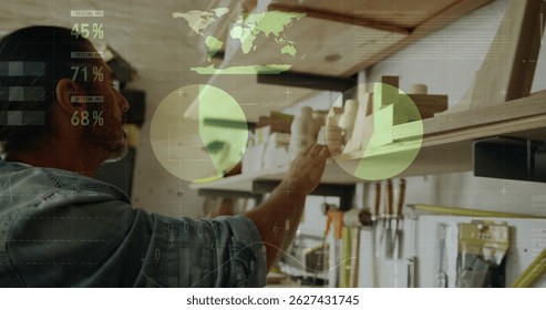 Image of data processing over caucasian male carpenter working in workshop.global communication, work and digital interface concept digitally generated image. - Powered by Shutterstock - Get 15% off with code: PIKWIZARD15