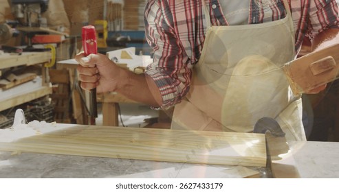 Image of data processing over caucasian male carpenter working in workshop. Global communication, work and digital interface concept digitally generated image.