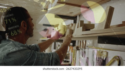 Image of data processing over caucasian male carpenter working in workshop. Global communication, work and digital interface concept digitally generated image.