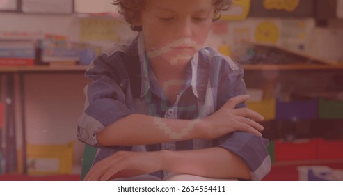 Image of data processing over caucasian schoolboy learning. Global education and digital interface concept digitally generated image.
