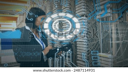 Image of data processing over caucasian woman checking computer wires. image of data processing over caucasian woman checking computer wires.