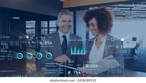 Image of data processing over diverse business people in office. Global finance, business, connections, computing and data processing concept digitally generated image.