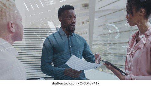 Image of data processing over diverse business people in office. Global business, finances, computing and data processing concept digitally generated image.