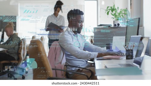Image of data processing over diverse business people in office. Global business, finances, computing and data processing concept digitally generated image.