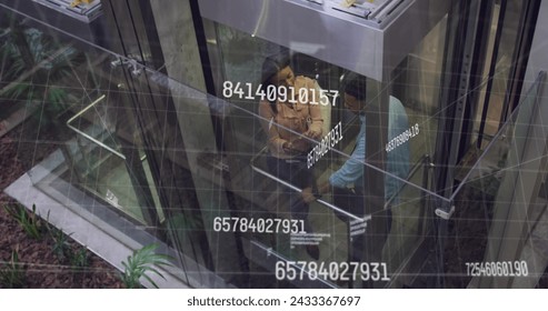 Image of data processing over diverse business people in elevator. Global business and digital interface concept digitally generated image. - Powered by Shutterstock