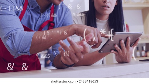 Image of data processing over diverse shop assistant and customer talking. Global business and digital interface concept digitally generated image.