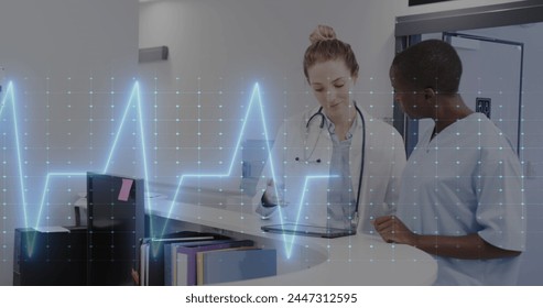 Image of data processing over diverse doctors in hospital. Global healthcare, science, medicine, research, computing and data processing concept digitally generated image.