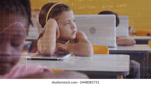 Image of data processing over diverse schoolchildren using tablets in classroom. Global education, computing and digital interface concept digitally generated image.