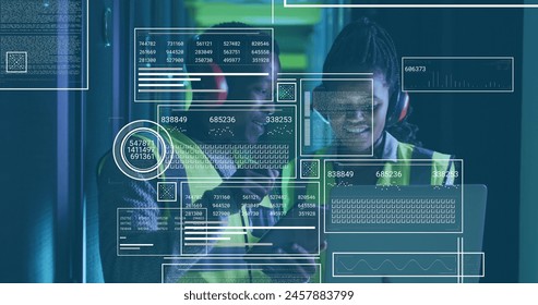 Image of data processing over diverse it technicians working by computer servers. Global business, finances, computing and data processing concept digitally generated image.