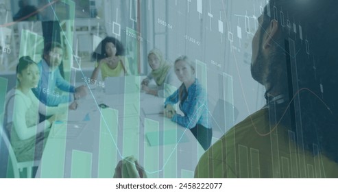 Image of data processing over diverse business people at office. Global business and digital interface concept digitally generated image.